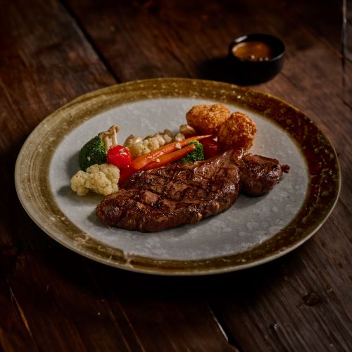 Australian Tenderloin Steak With Grilled Vegetables And Potatoes